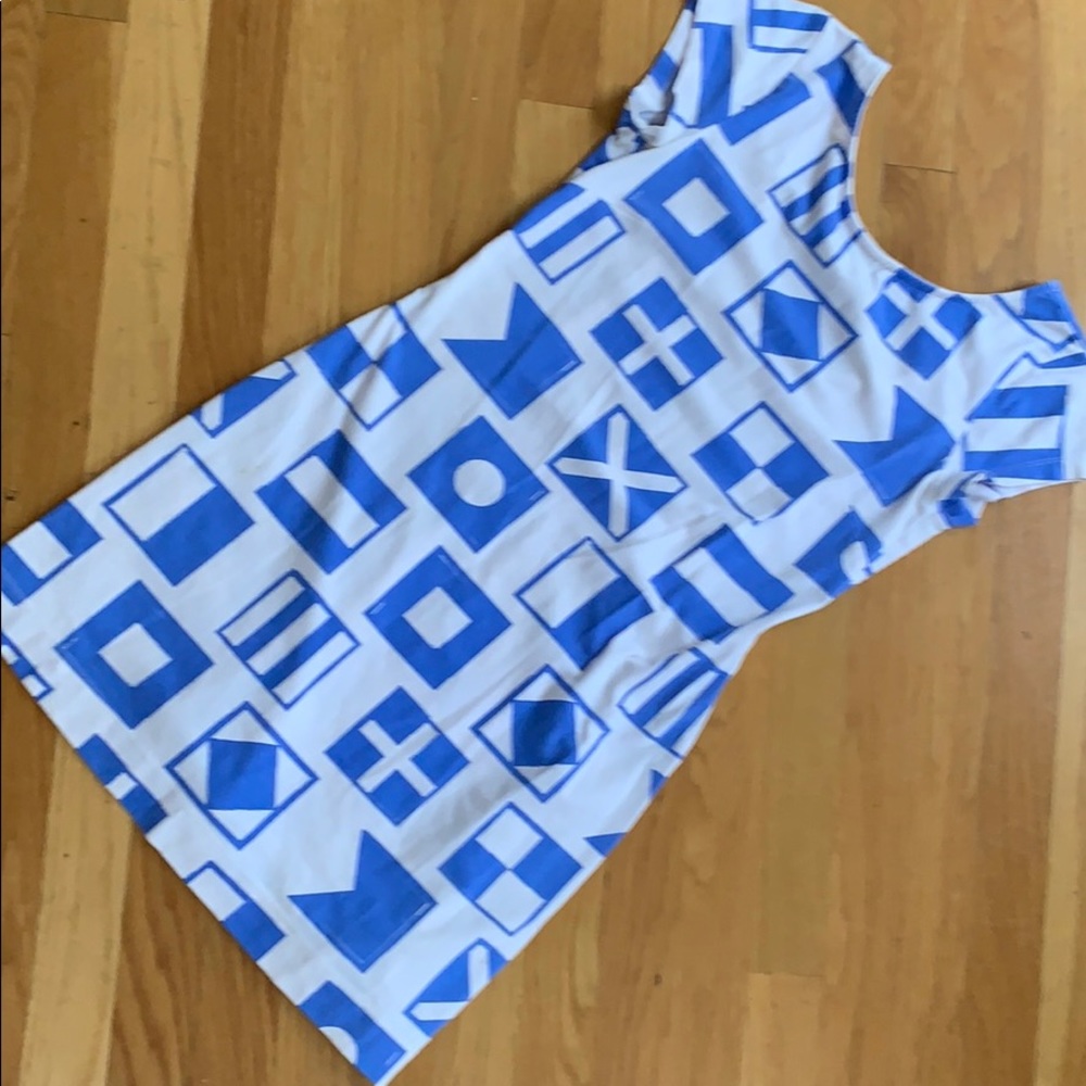 White and blue short sleeve Mahi Gold Addie dress.